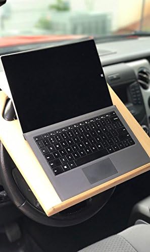 The Notebook steering wheel desk measures 15??× 13 1/8.??This compact WheelDesk provides a stable surface for most laptops, tablets, phones, or paperwork.