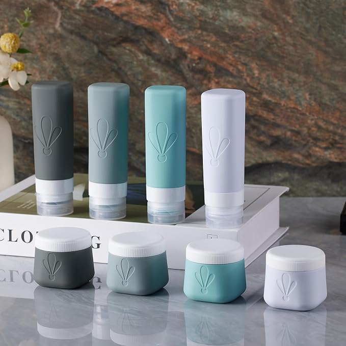 INSFIT travel bottles for toiletries 8 Pack, Leak proof Travel Size Toiletries Containers with toiletry bag, Squeezable Silicone Bottles & Cream Jars, Travel Essentials BPA-Free kit for Shampoo