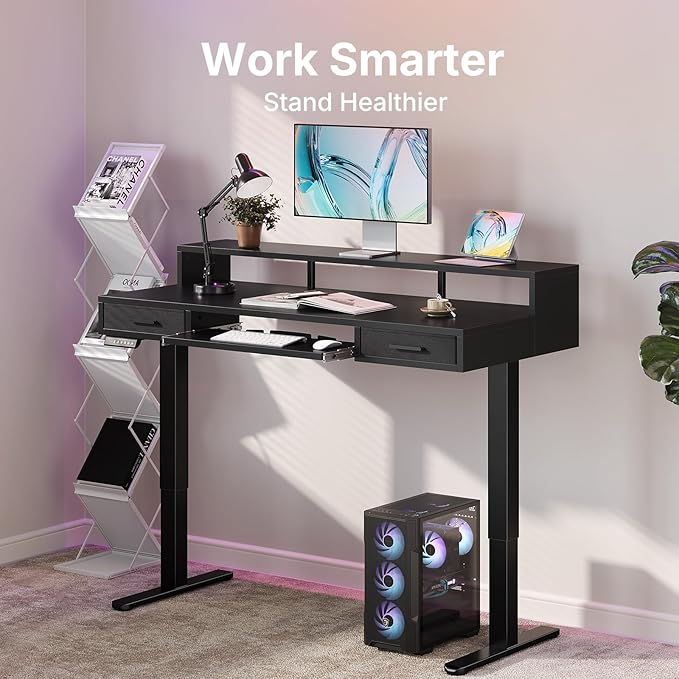 HUANUO 63″ x 26″ Electric Standing Desk with 2 Drawers &24.4″ Large Keyboard Tray, C-Clamp Mount Compatible, Adjustable Computer Desk for Office, Sit Stand Up Desk with 4 Height Presets, Black