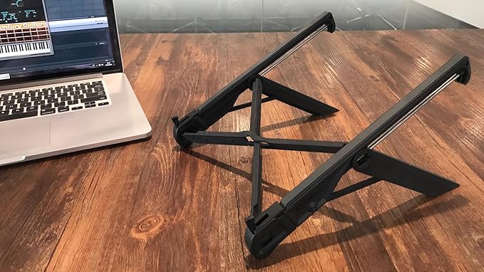 K7 Laptop Stand, Foldable Portable Laptop Stand,Black, Lightweight Ergonomic Laptop Riser for Desk for Laptops universial fit,one Step for Open & Close Design,Compact for Travel,Office,Home,Library
