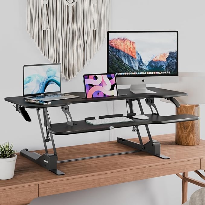 Mount-It! 47" Standing Desk Converter, XL Desktop Sit-Stand Desk Riser with Gas Spring Height Adjustment, Wide Desk Topper for Dual Monitors or Monitor & Laptop, Keyboard Tray, Black
