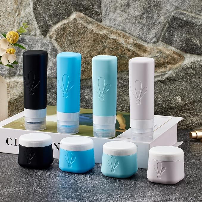 INSFIT travel bottles for toiletries 8 Pack, Leak proof Travel Size Toiletries Containers with toiletry bag, Squeezable Silicone Bottles & Cream Jars, Travel Essentials BPA-Free kit for Shampoo