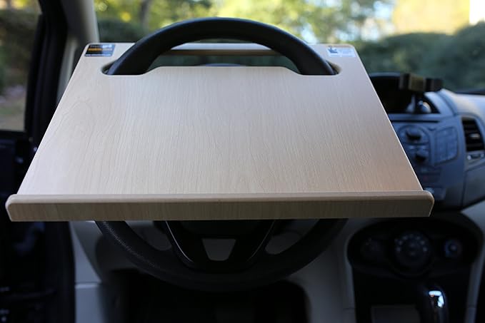 The Notebook steering wheel desk measures 15??× 13 1/8.??This compact WheelDesk provides a stable surface for most laptops, tablets, phones, or paperwork.