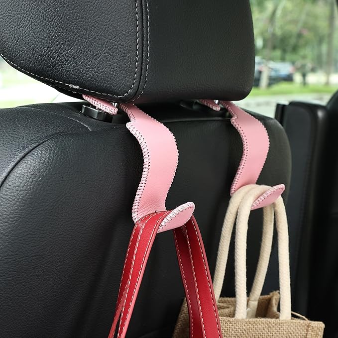 Amooca Car Seat Headrest Hook Universal Vehicle Storage Hanger Leather with Metal Car Seat Back Organizer for Handbag Purse Coat Pink 4 Pack